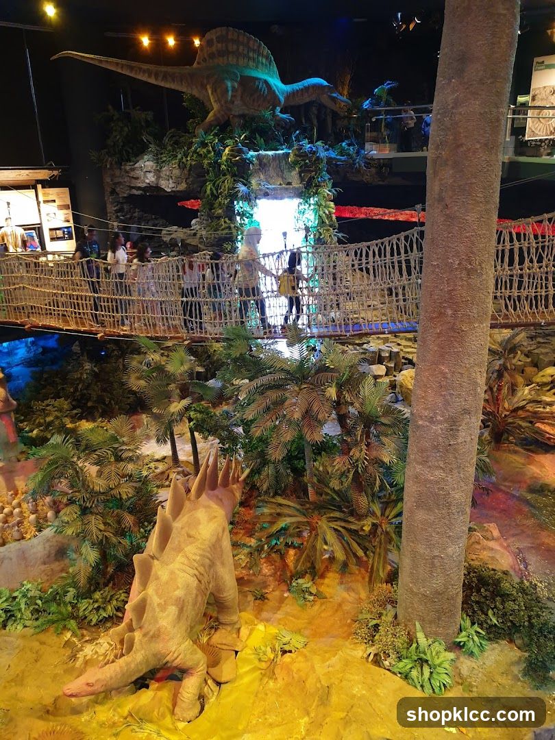 Dinosaur exhibit with suspension bridge