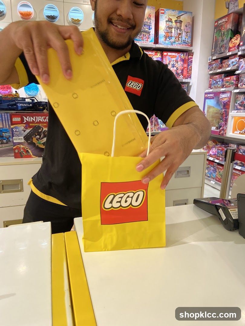 Lego Store Employee Packing a Bag