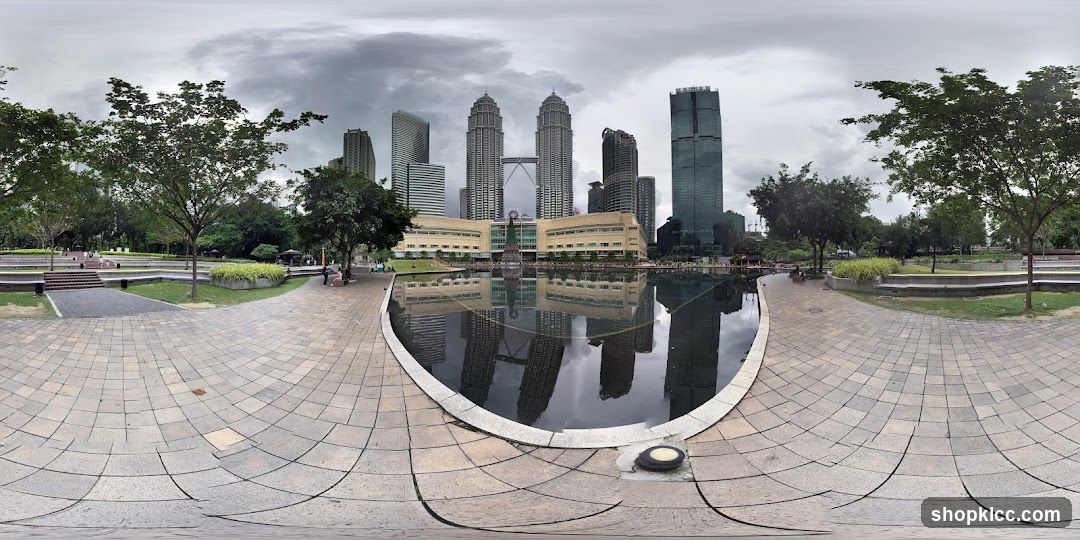 Park with city skyline reflection