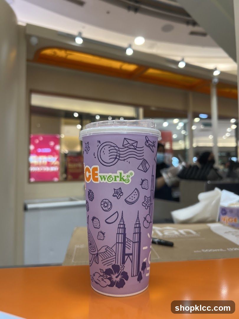 Juice Cup with Cityscape and Fruit Design
