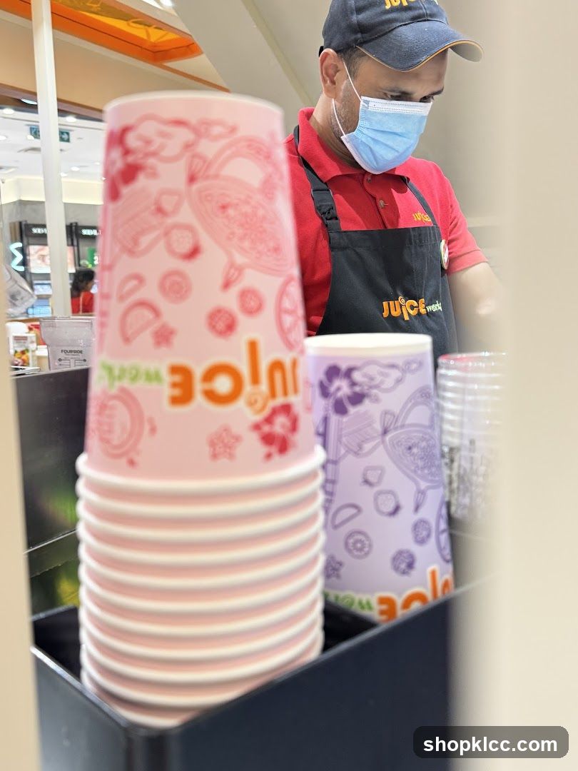 Juice World Staff Preparing Drinks