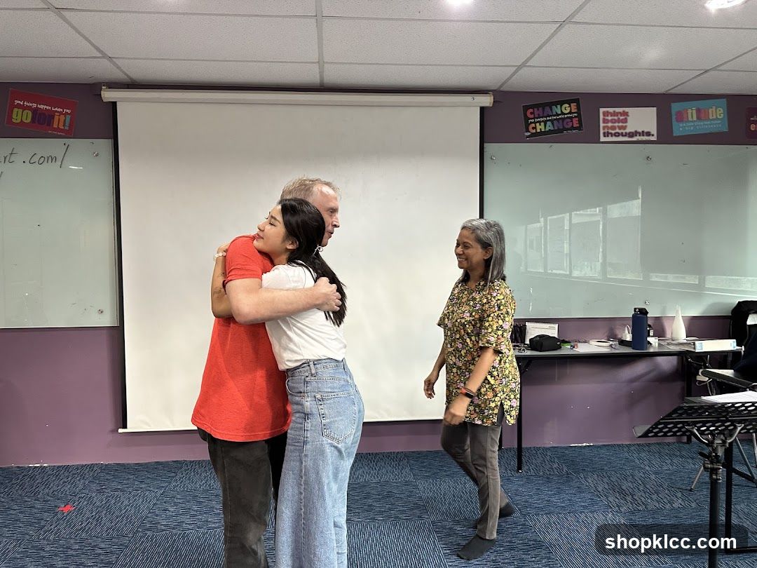 Classroom Scene with Hugging People