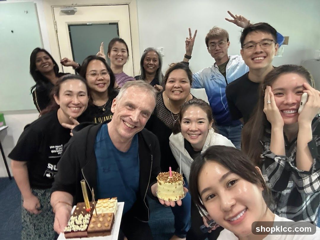 Group photo with birthday cake