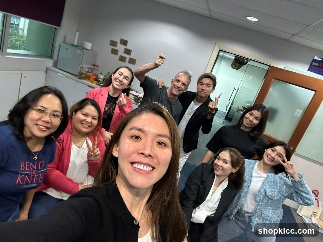 Group selfie in office or break room