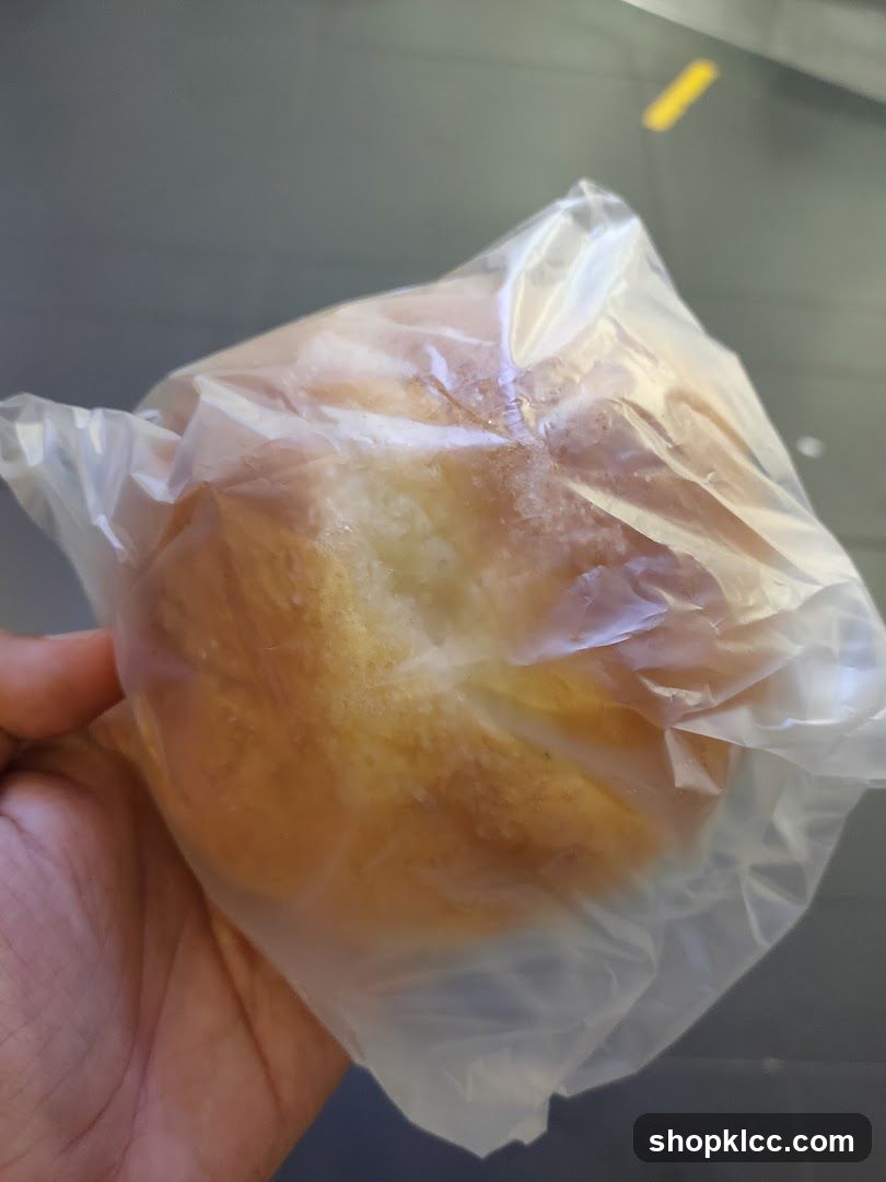 Bread roll in plastic bag