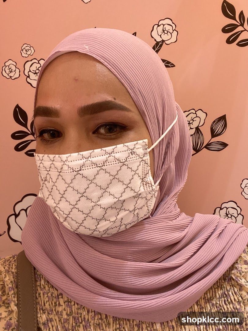Woman wearing a mask and hijab