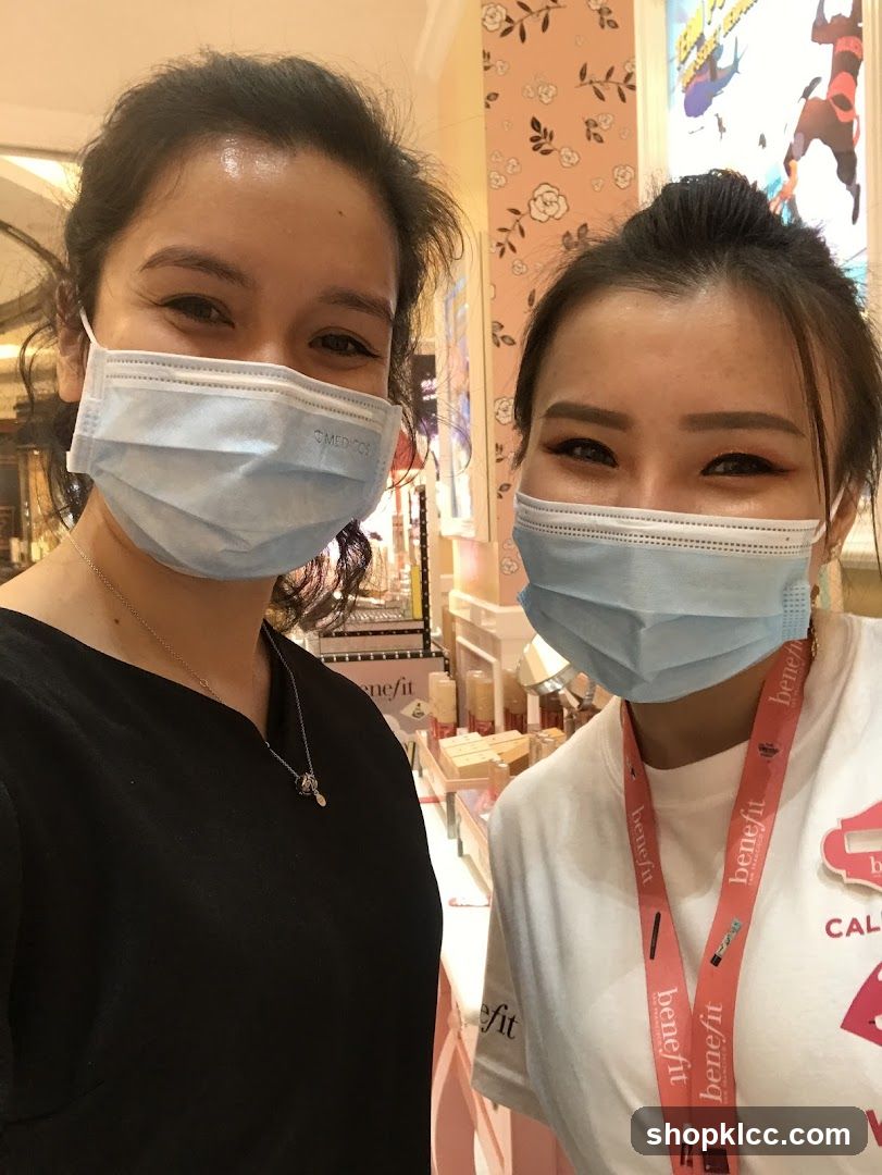 Two women wearing face masks