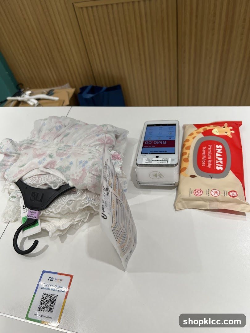 Baby Clothes and Wipes at Checkout