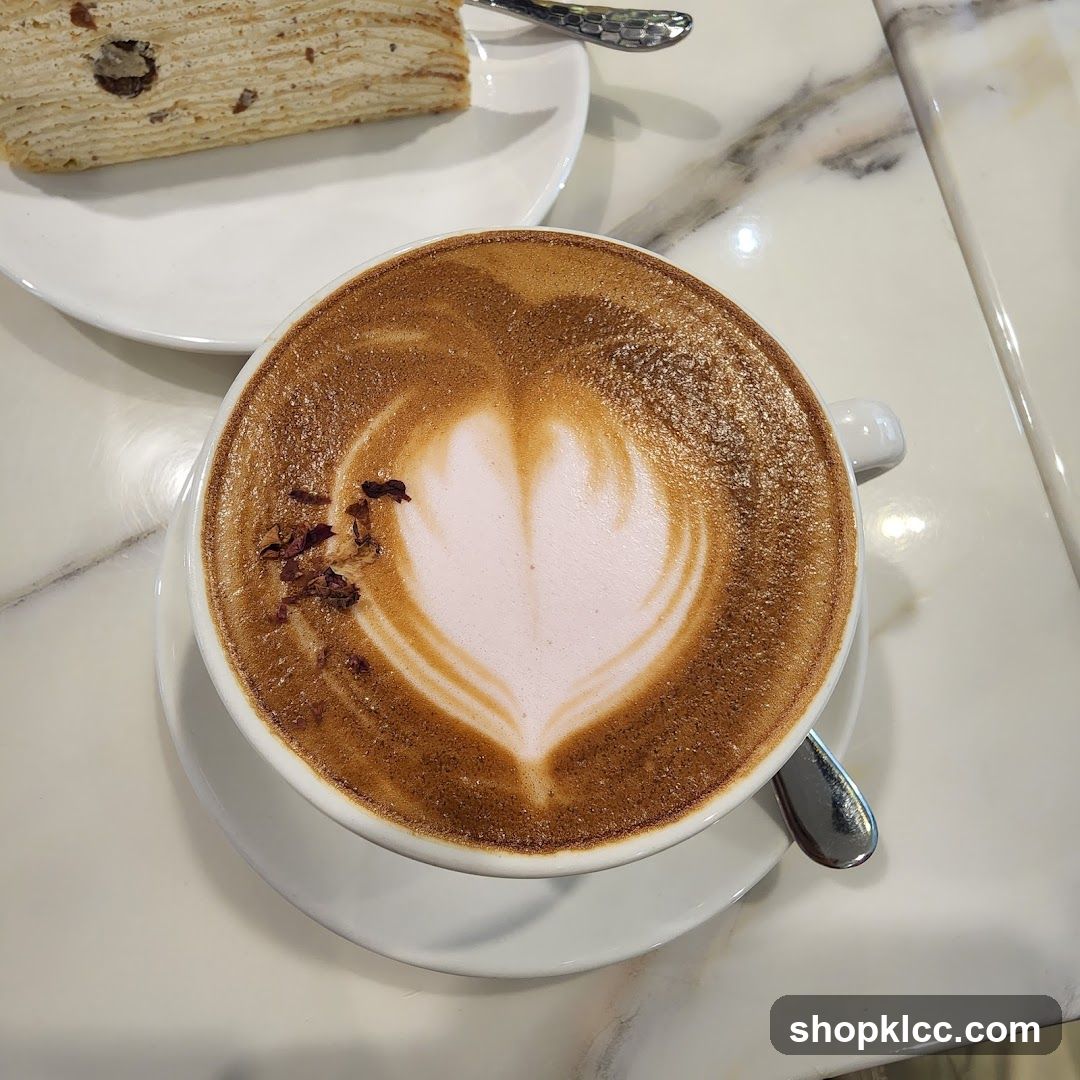 Latte with Heart Art and Cake