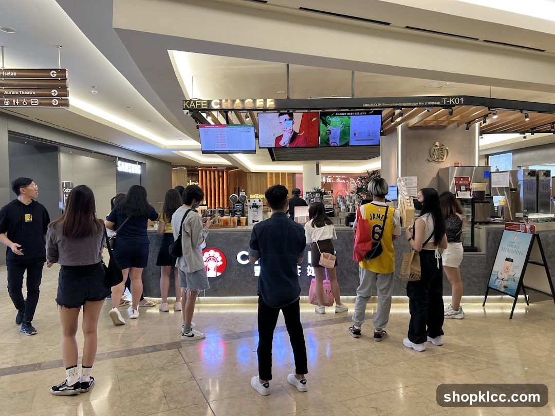 People queuing at a cafe