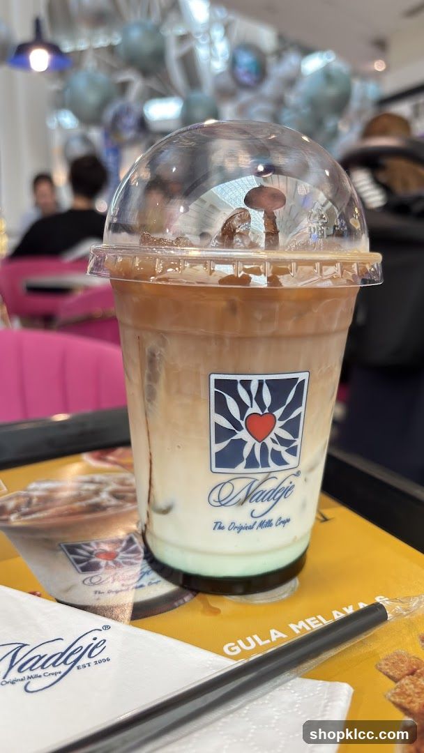 Iced Coffee with Nadeje Logo