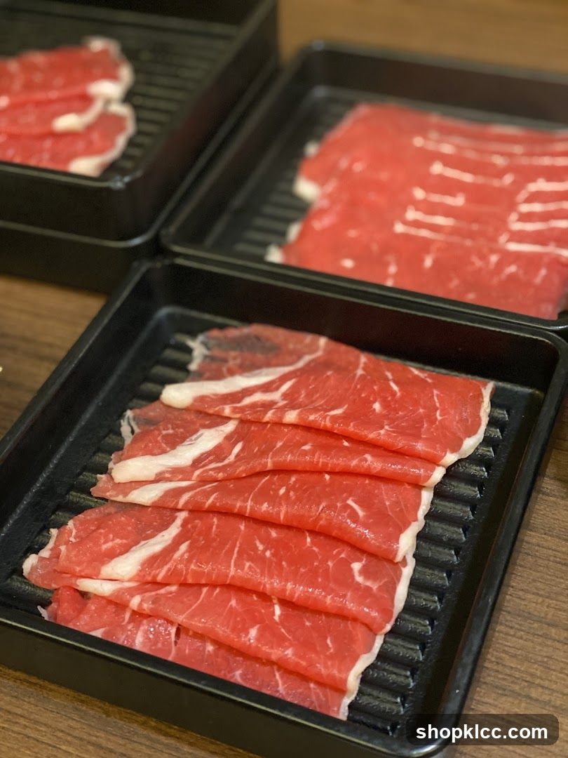 Raw Beef Slices on Grill Trays