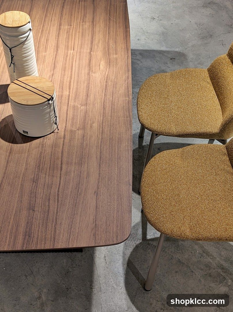 Wooden Table with Ceramic Jars and Textured Chairs