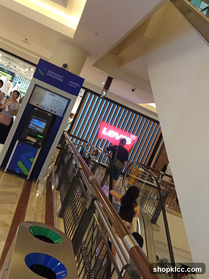 Shopping Mall Interior with ATM and Levi's Sign