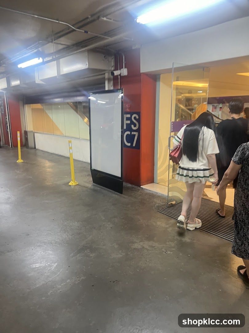 Entrance to a building with people walking in