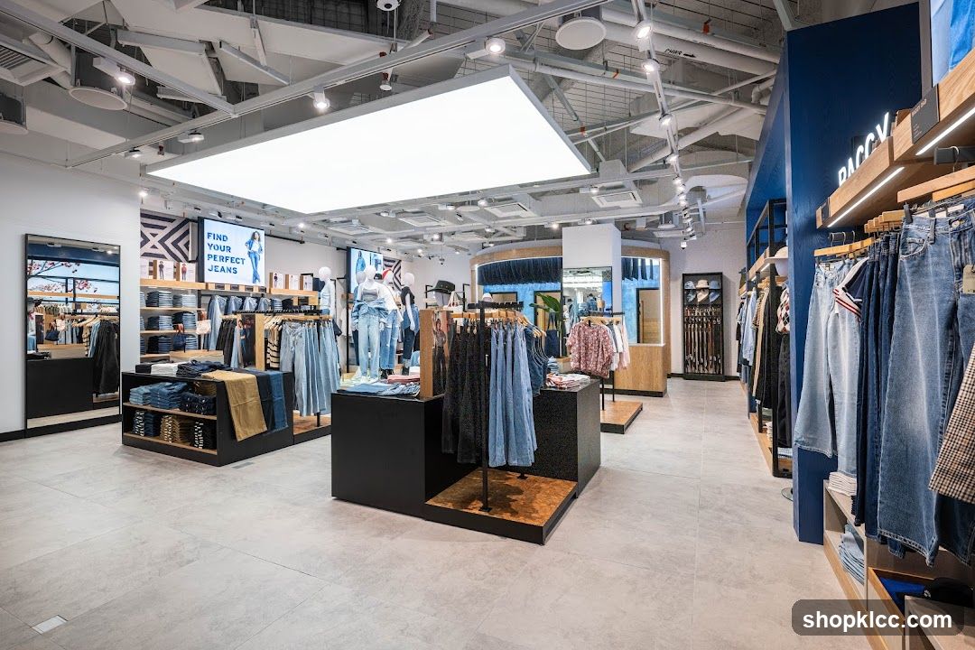 Clothing store interior with jeans and apparel displays