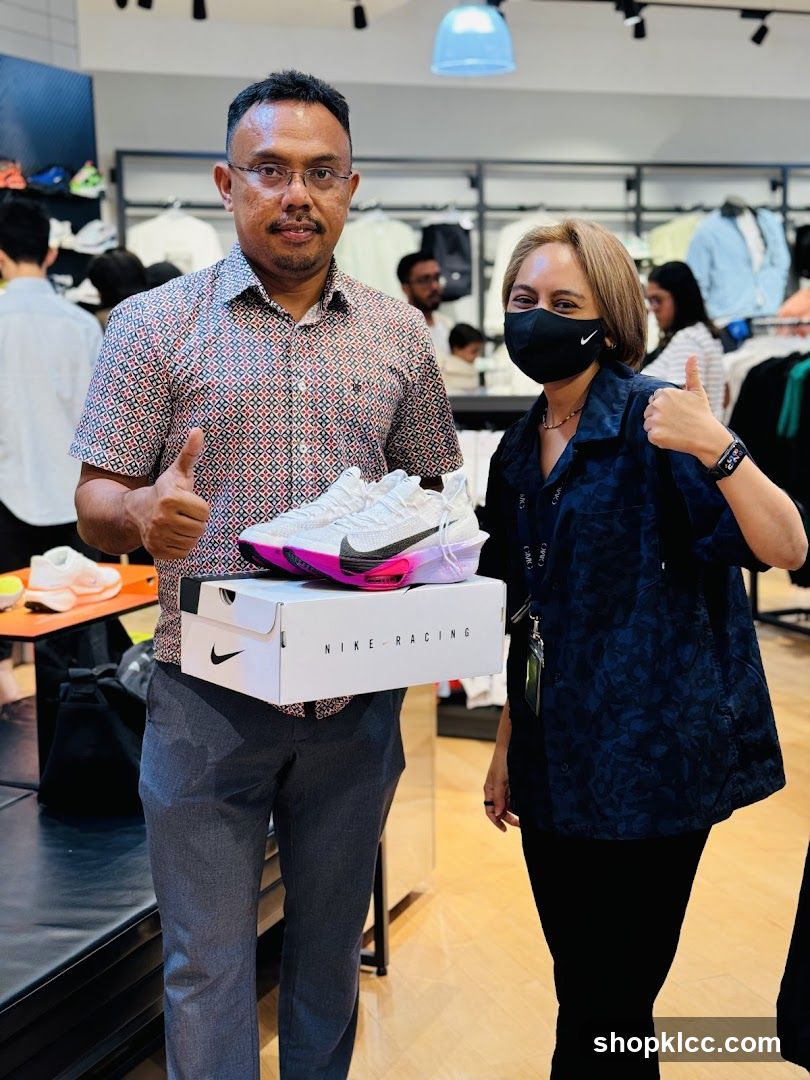 People holding Nike shoes in a store