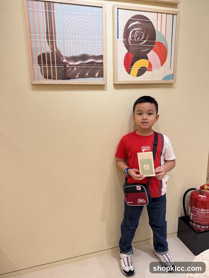 Boy holding a card