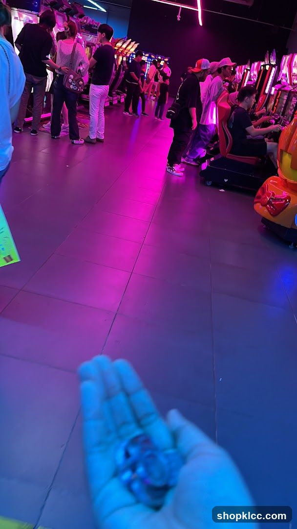 Arcade with People Playing Games