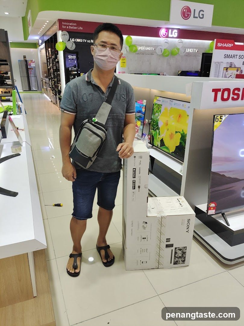Man with Electronics Boxes