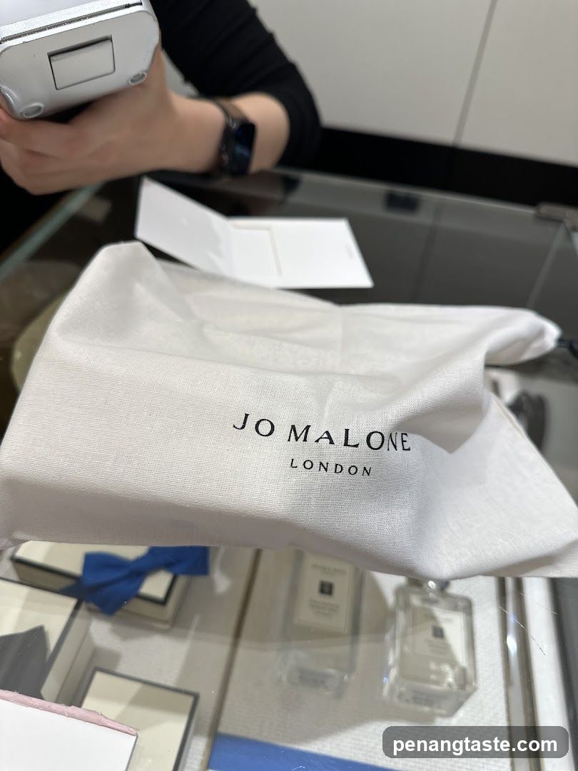 Jo Malone London Shopping Bag and Perfume Bottles