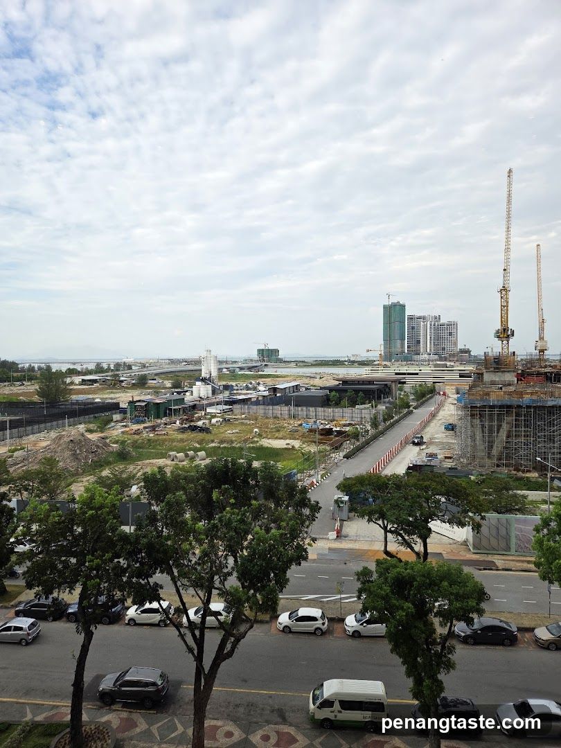Construction Site with Cranes and Buildings