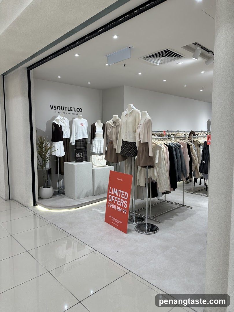 VS Outlet Storefront with Mannequins and Sale Sign