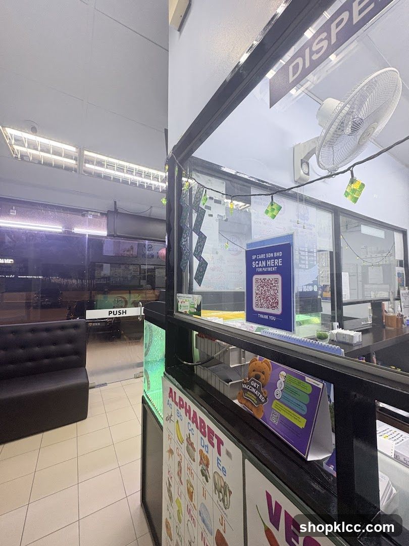 Interior of a shop with display counter and QR code sign