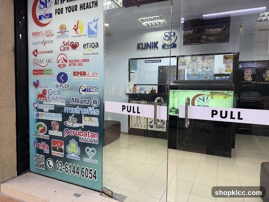 Klinik SP Entrance with Health Brand Logos