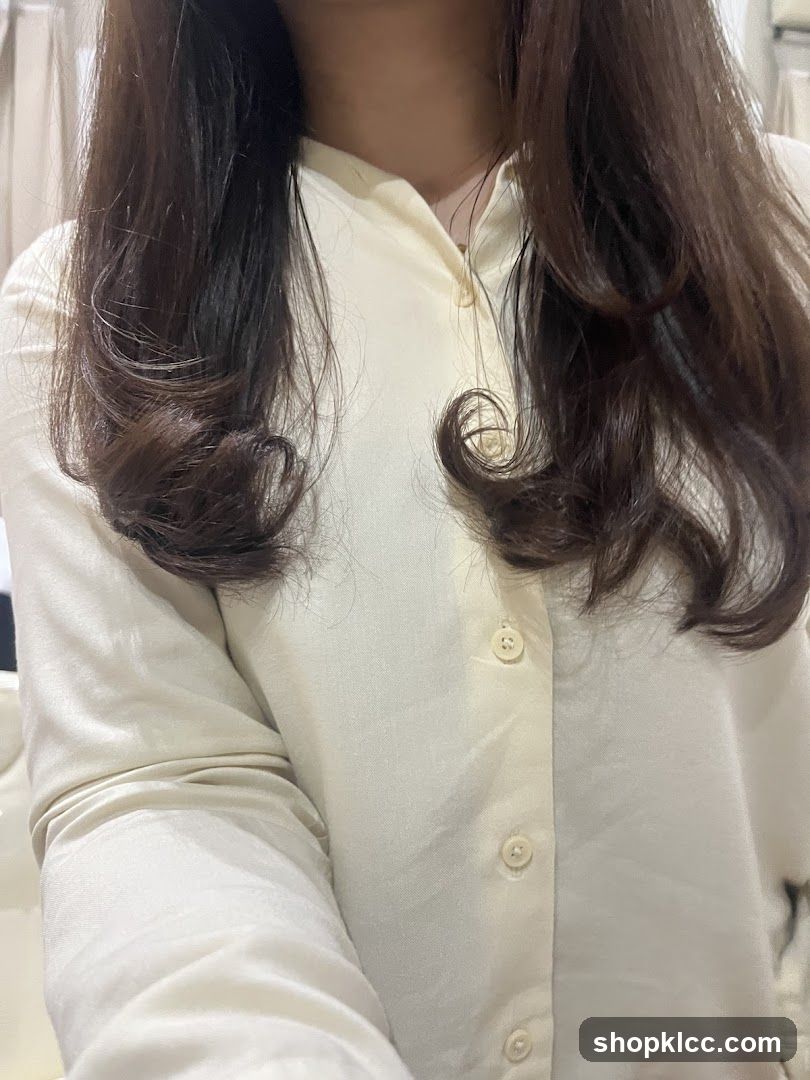 Person in Cream Button-Down Shirt