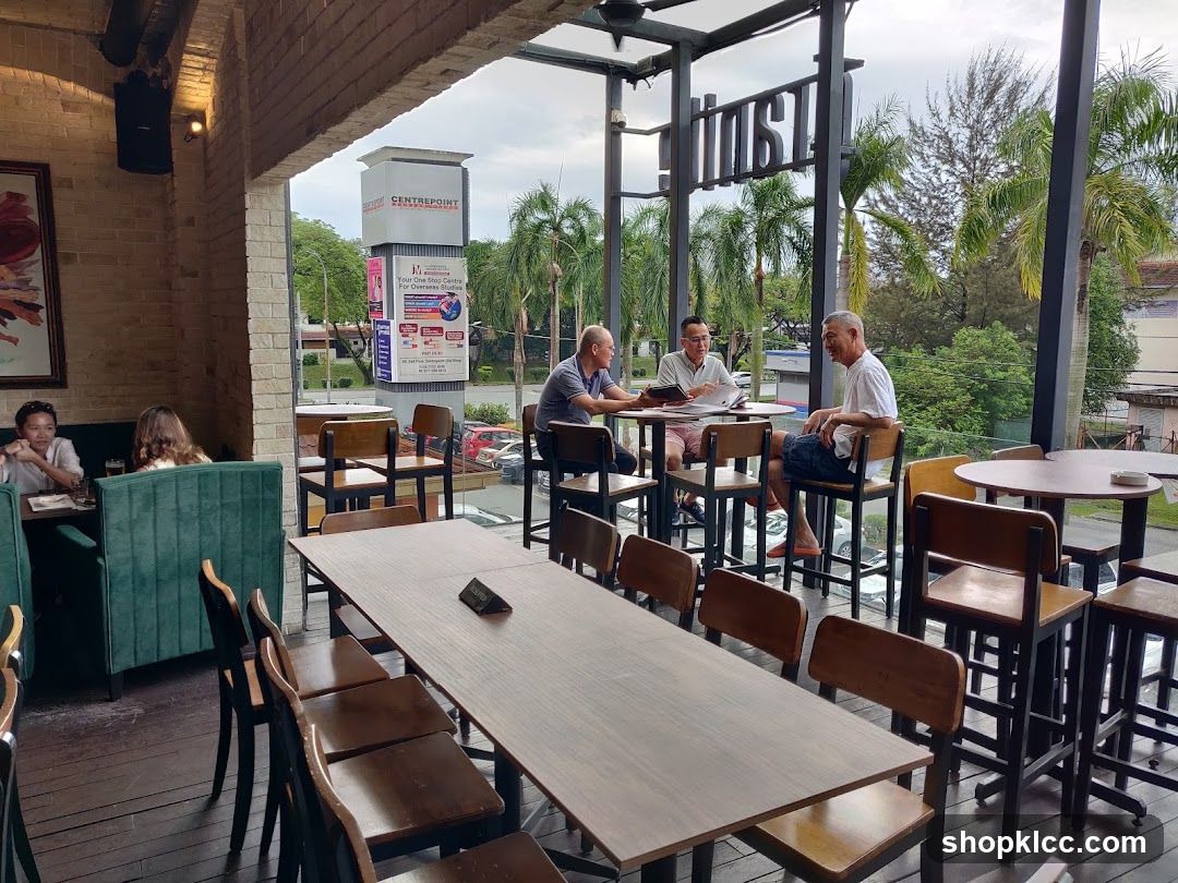 Outdoor Cafe Interior with Patrons