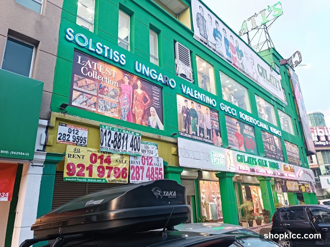 Fashion Store Facade with Solstice and Ungaro Signage