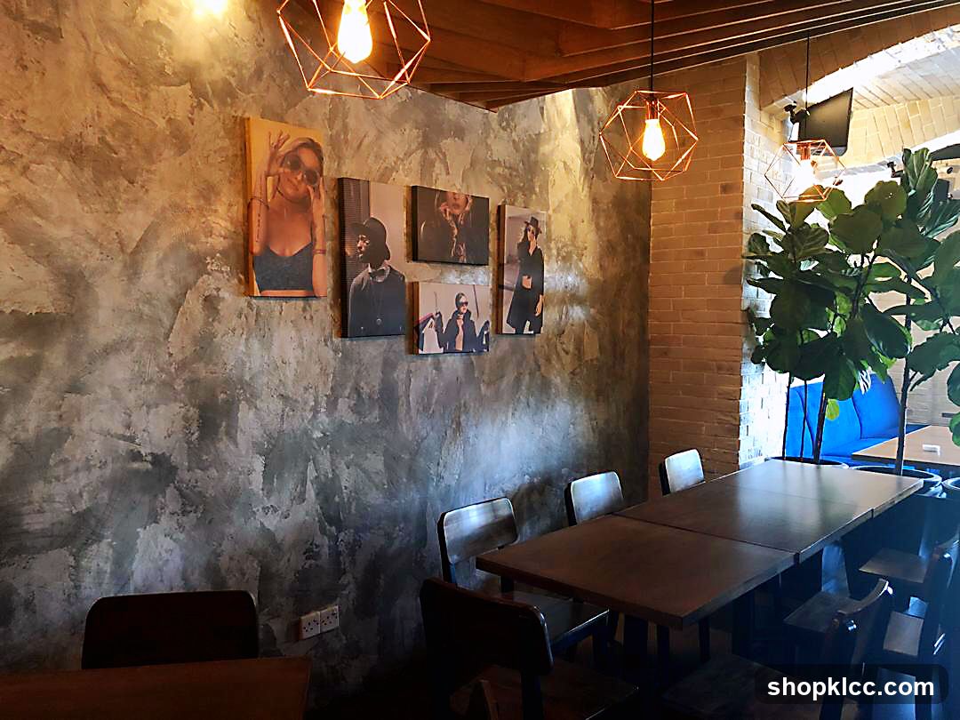 Interior Cafe with Art Wall and Wooden Tables