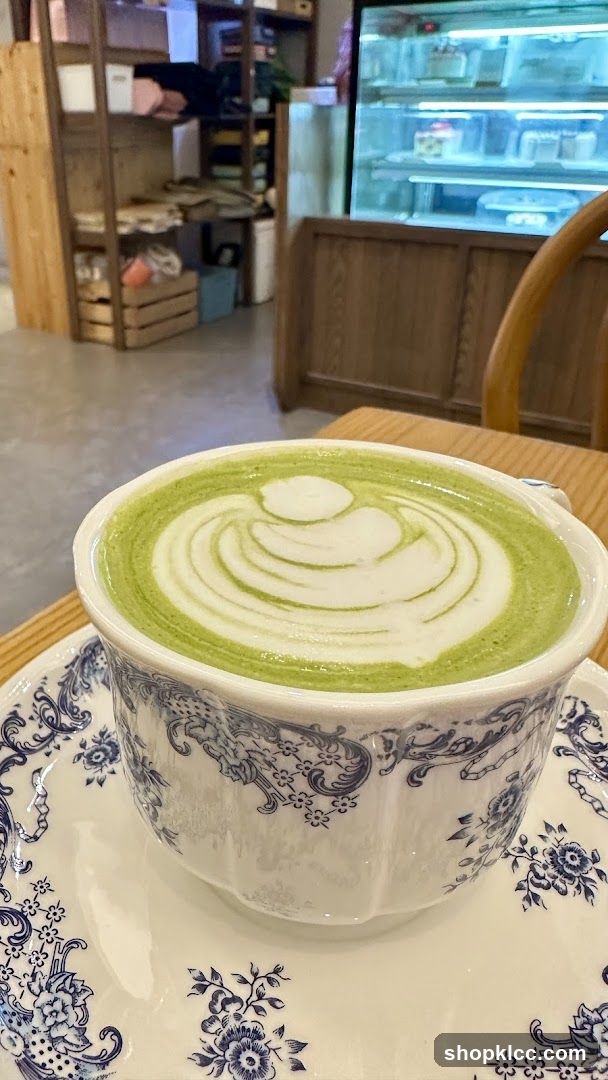 Matcha Latte in a Decorative Cup