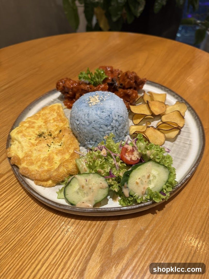 Blue Rice Plate with Omelette and Fried Chicken