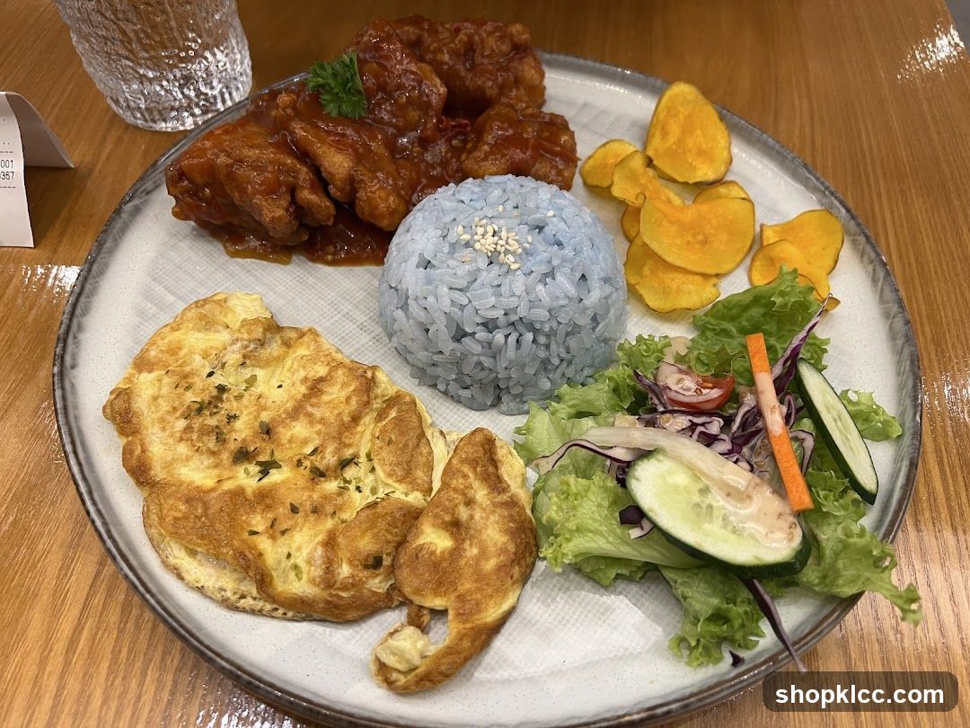 Blue Rice Plate with Fried Chicken and Omelette