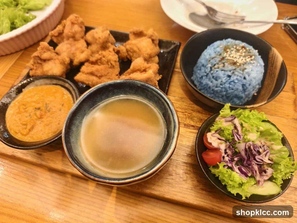 Fried Chicken Meal with Blue Rice and Salad