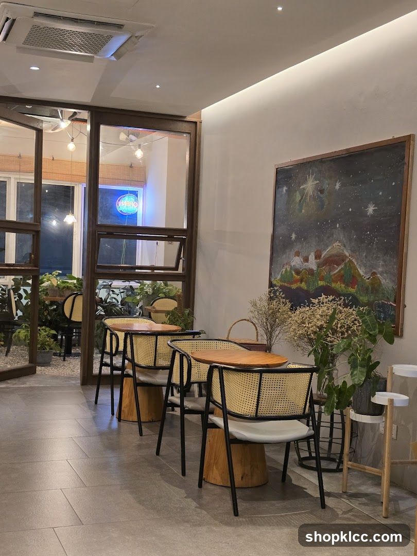 Interior of a cozy cafe with plants and artwork