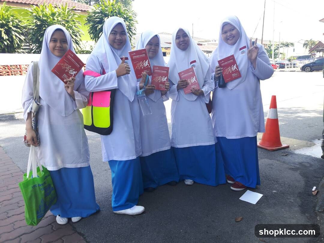 Students holding books