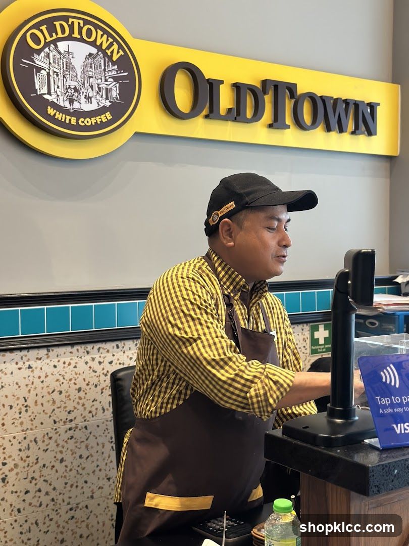 Old Town White Coffee Staff at Counter