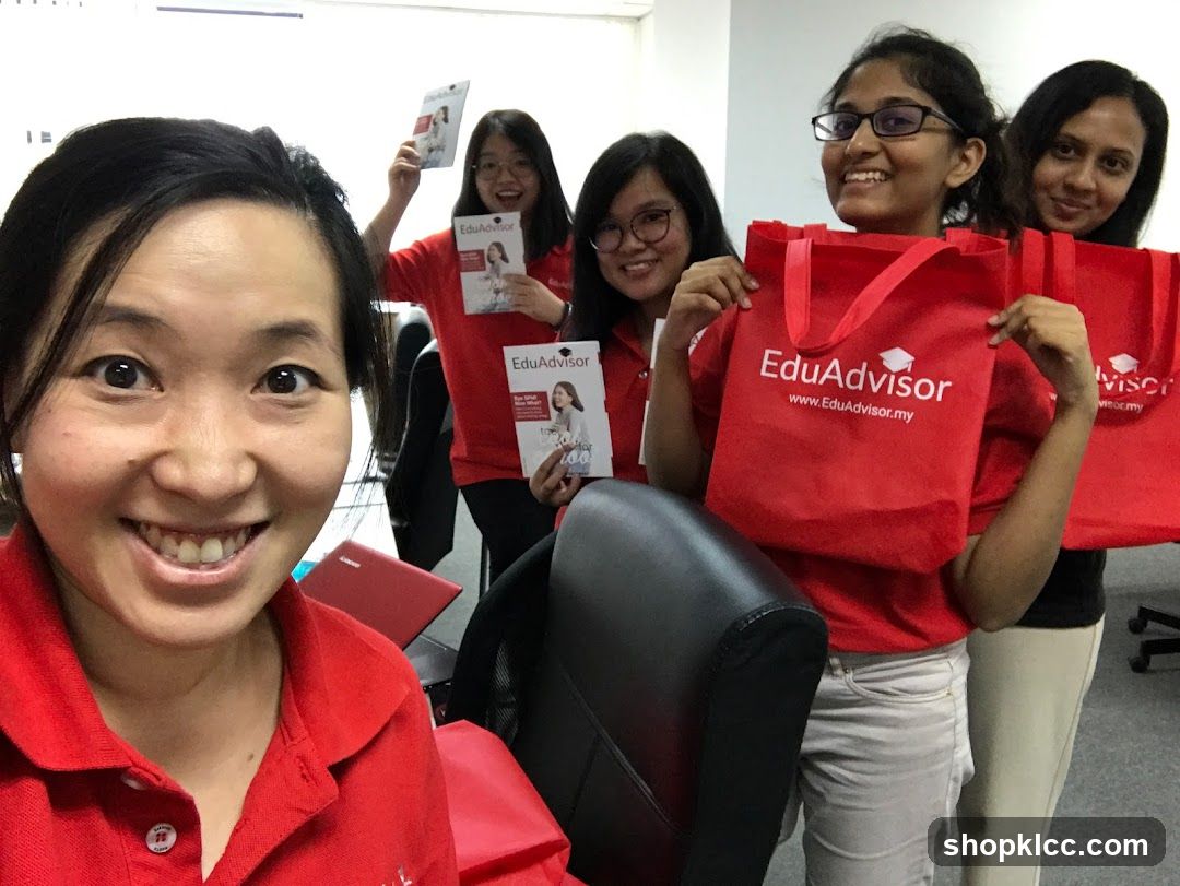 Group of women holding branded items