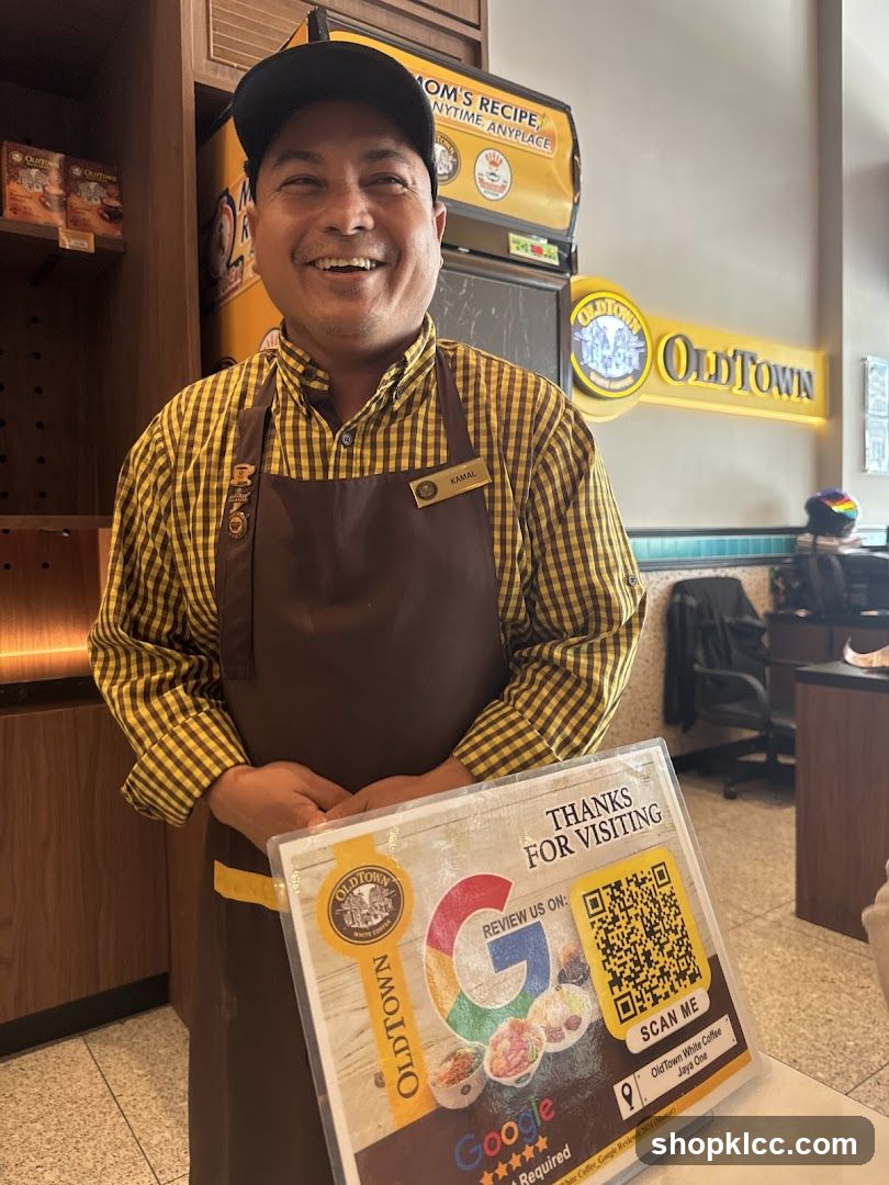 OldTown Staff Member Holding Google Review Sign