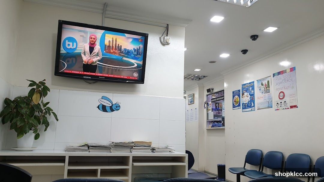 Waiting Area with TV and Posters