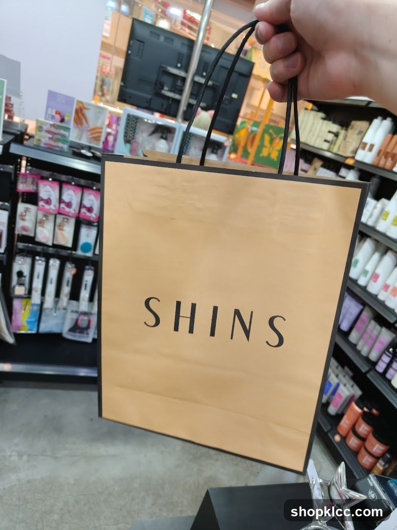 Shopping Bag with "SHINS" Logo