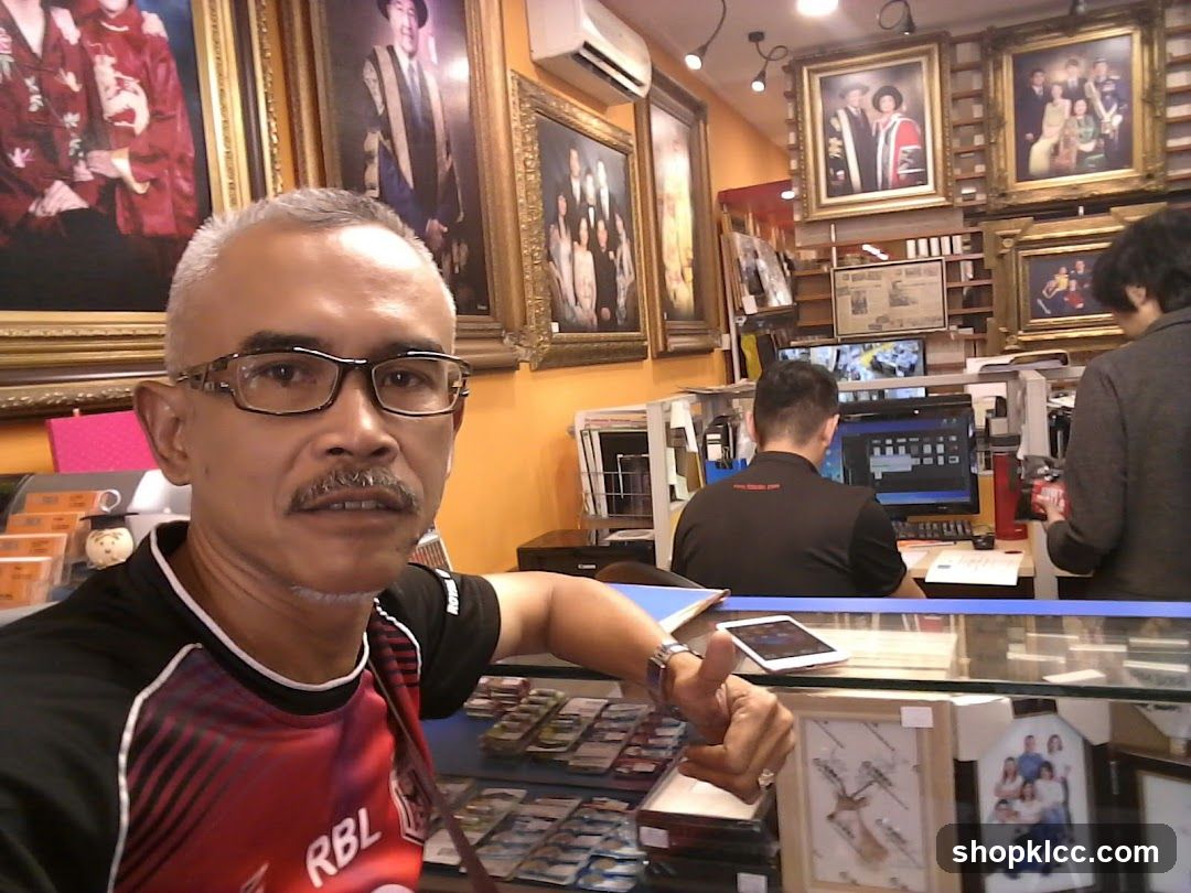 Portrait of a man in a photo shop interior