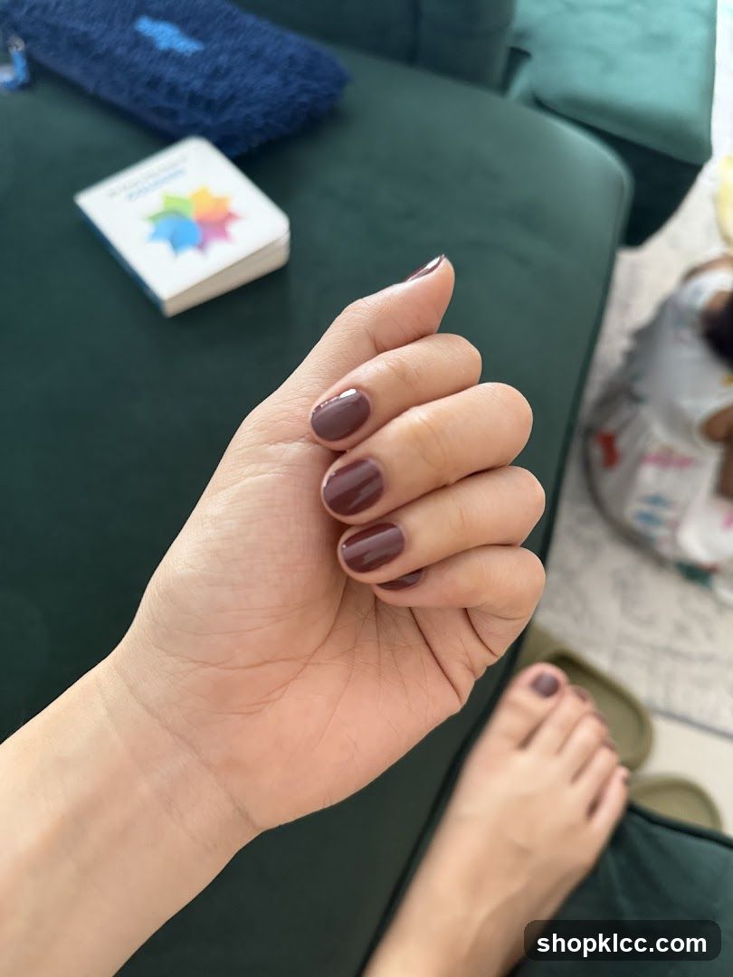 Woman's Hands and Feet with Burgundy Nail Polish