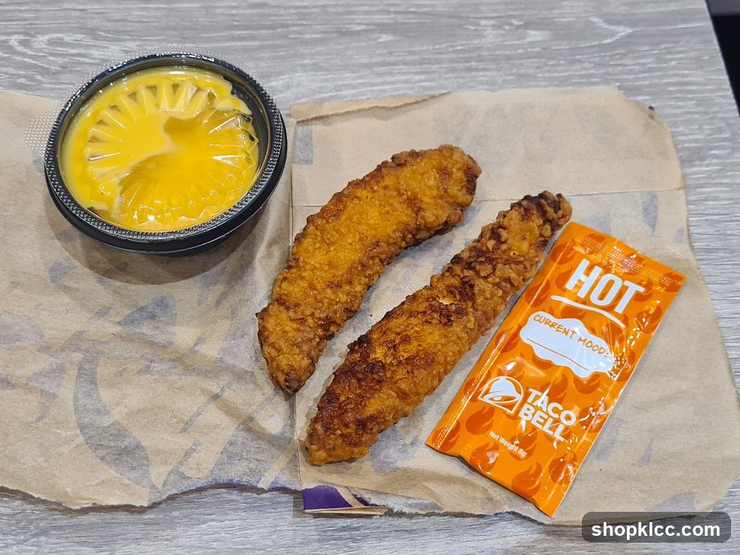 Taco Bell Chicken Strips with Nacho Cheese Sauce and Hot Sauce