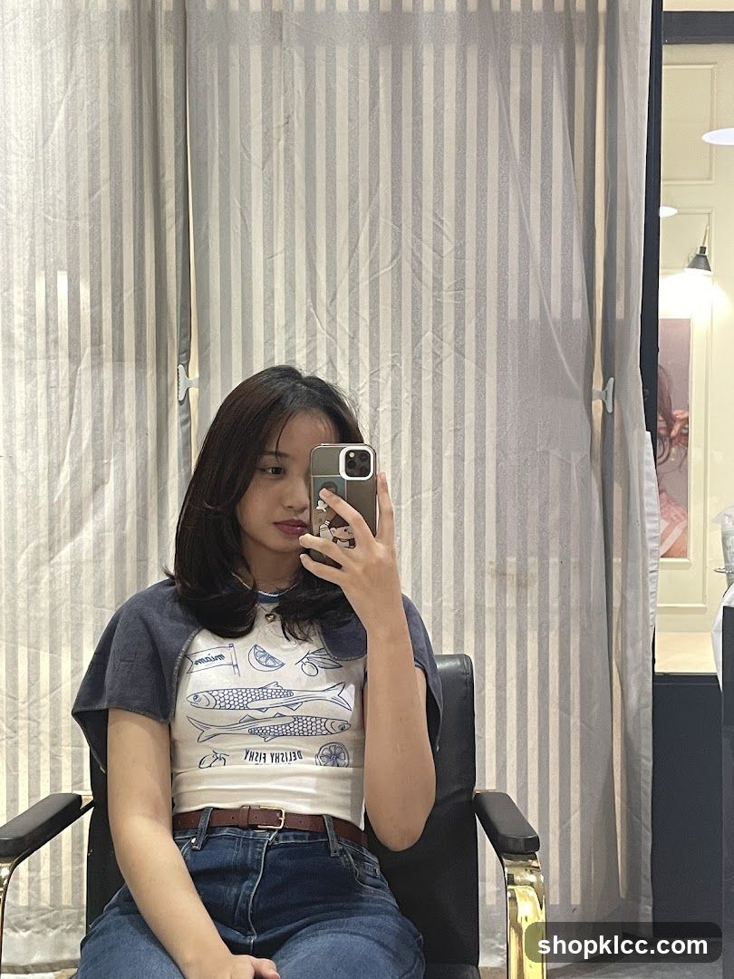 Woman taking a selfie in a salon