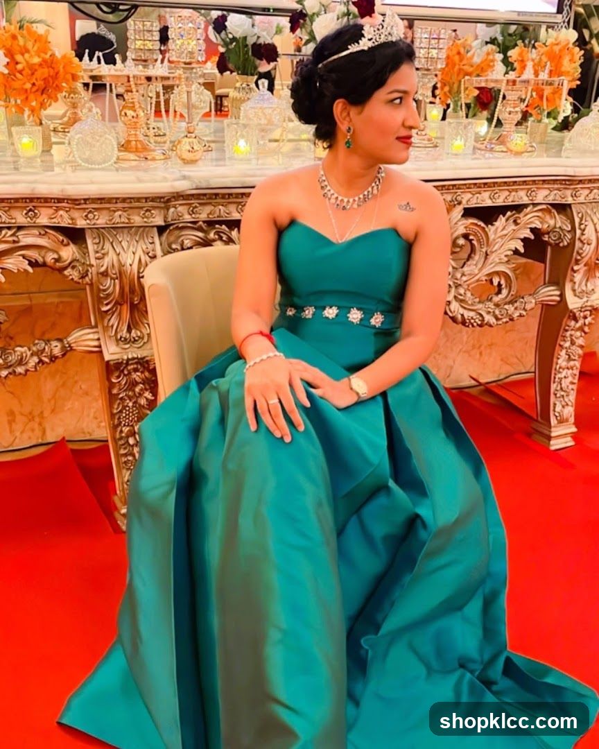 Woman in a Teal Gown at a Formal Event