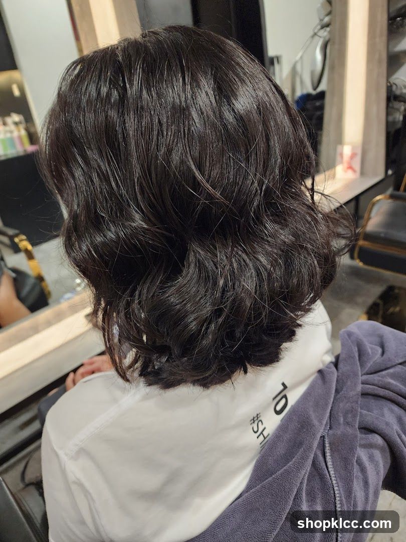 Woman with styled dark hair